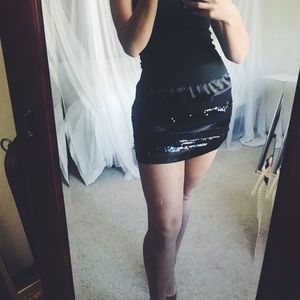 Bebe black sequin mini skirt- size M